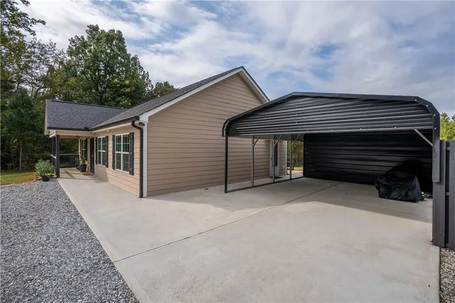 a front view of a house with a garage