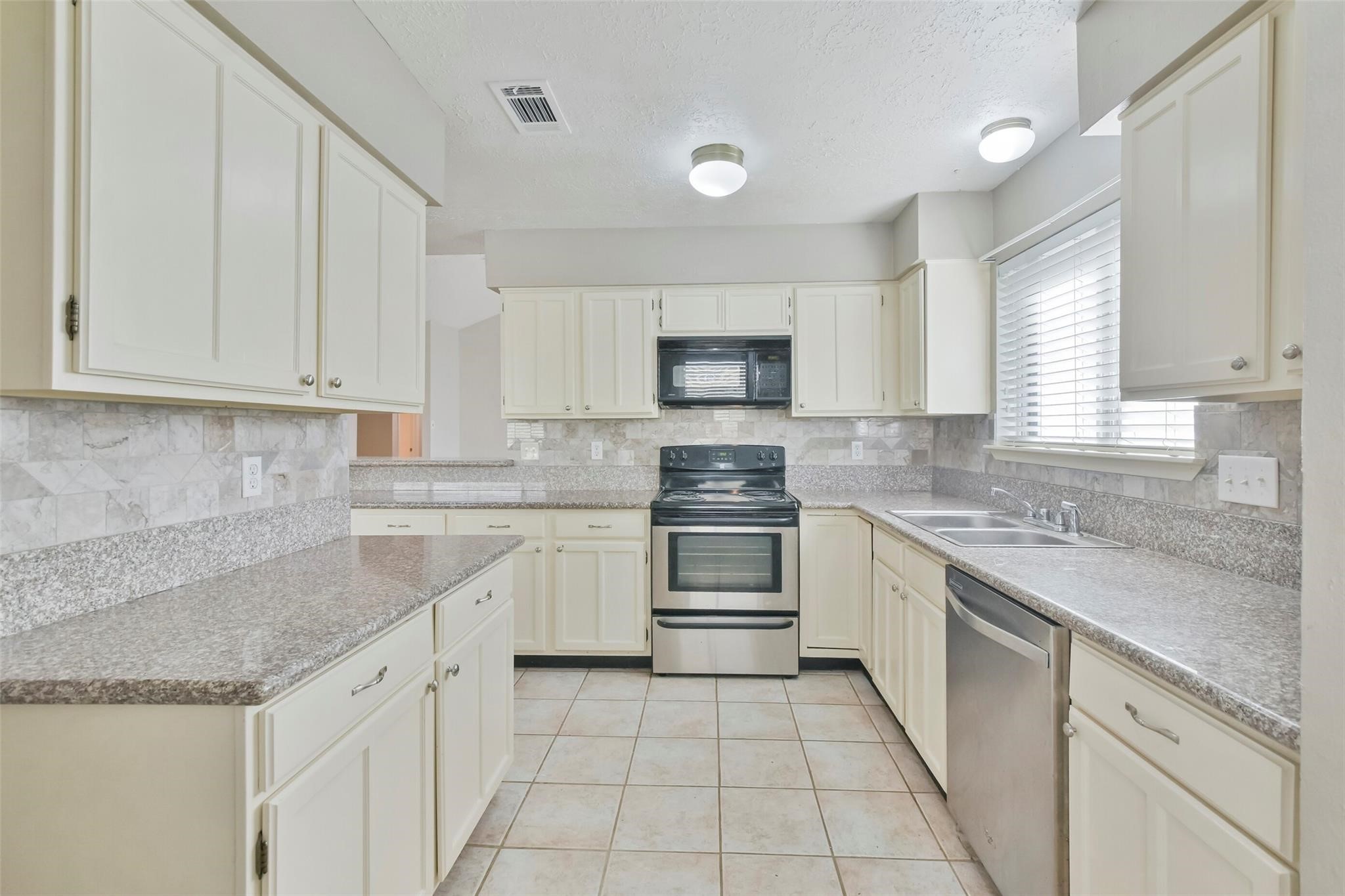 4831 Bridgemont Lane Spring, TX 77388 - Photo 11 of 29 Kitchen offers a lot of countertop space