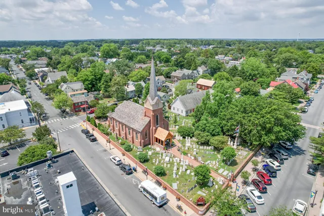 an aerial view of a houses with outdoor space
