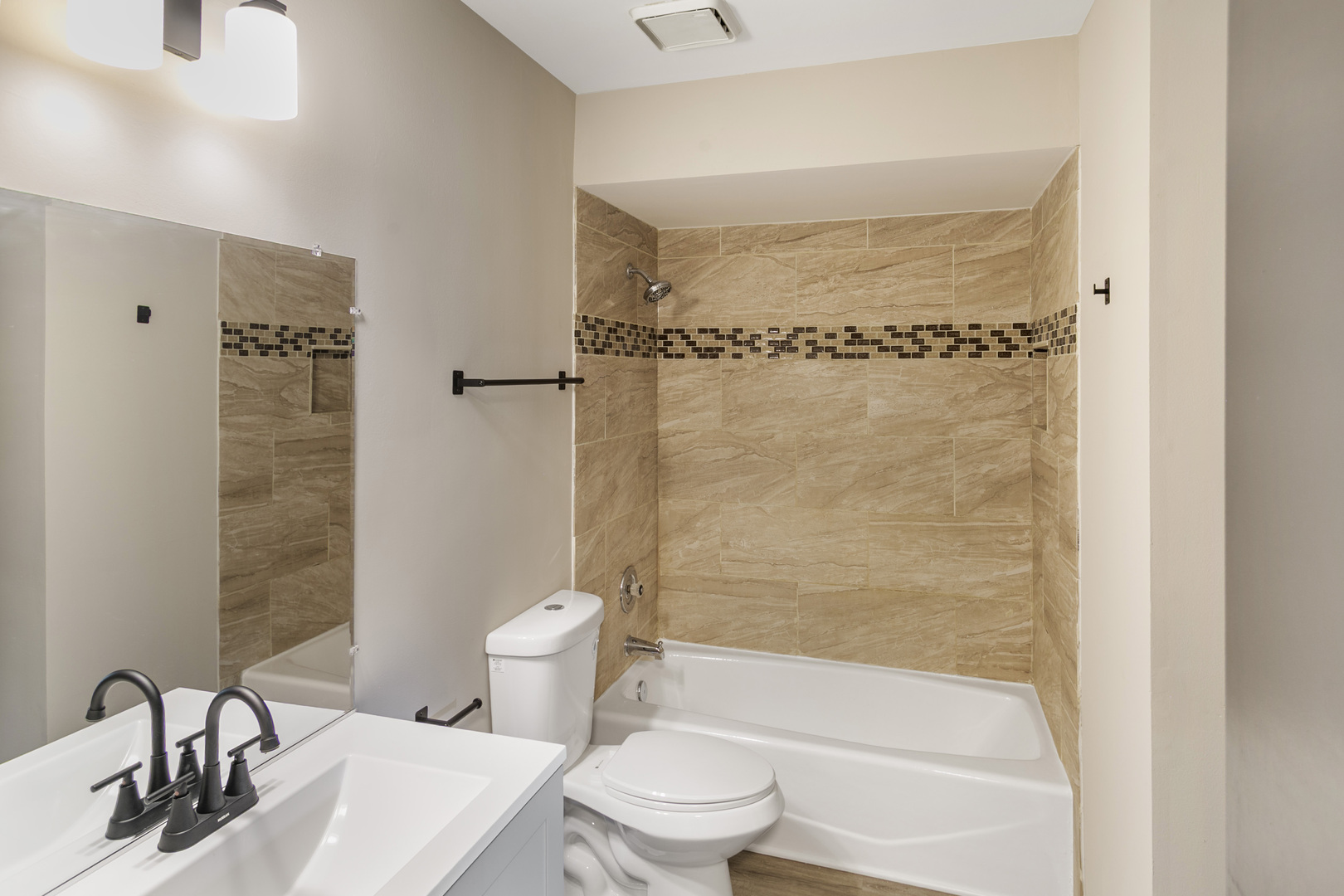 3518 Jacqueline Drive Crete, IL 60417 - Photo 11 of 23 a bathroom with a bathtub shower sink mirror and toilet