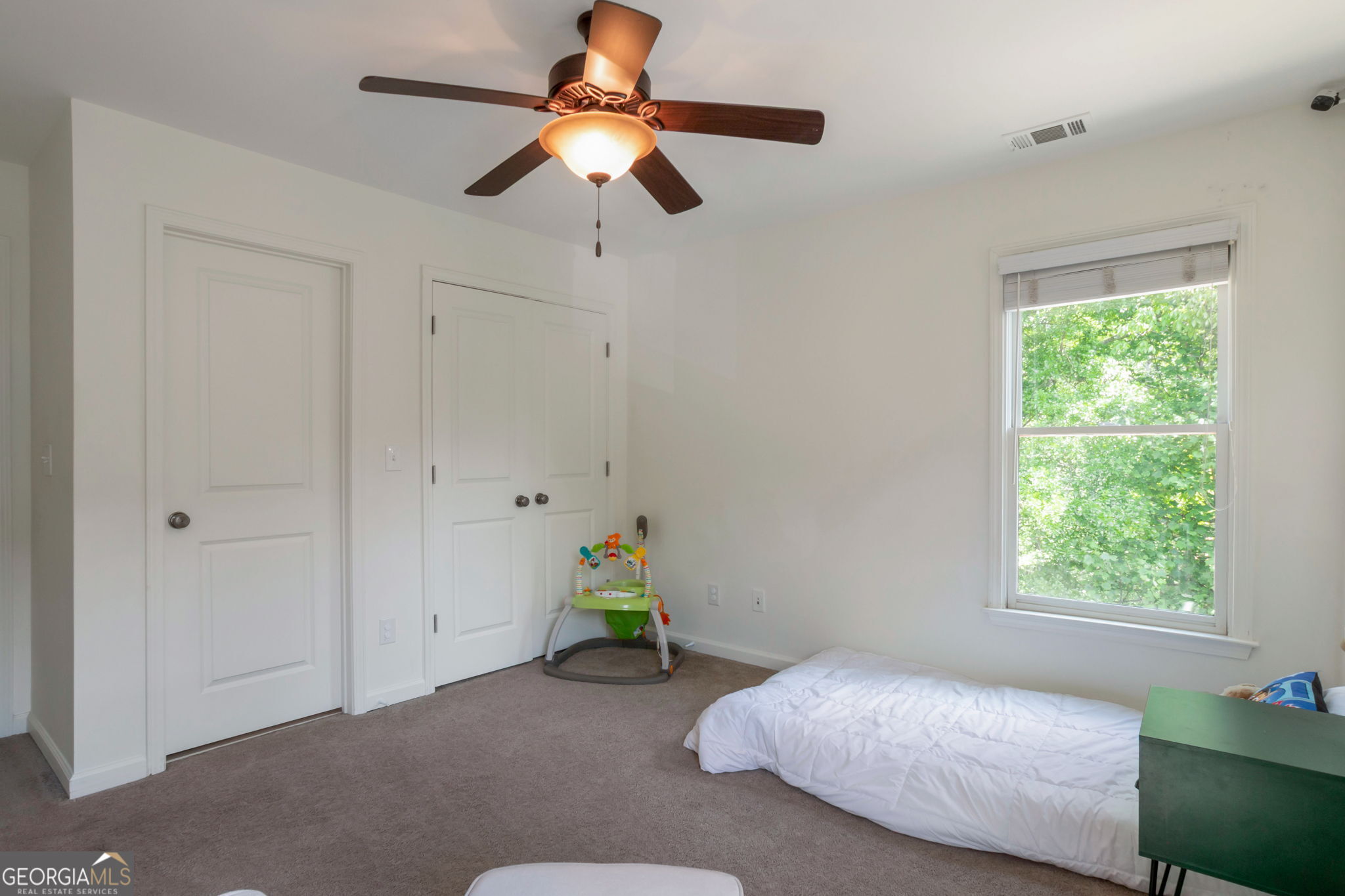 2524 Kickerillo Way Southeast Atlanta, GA 30316 - Photo 34 of 50 a bedroom with a bed and a window
