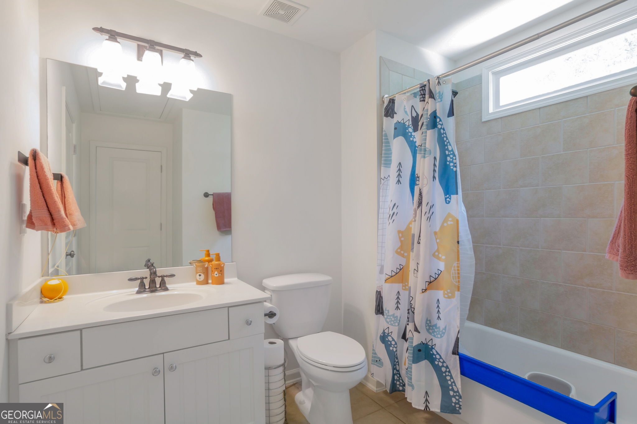 2524 Kickerillo Way Southeast Atlanta, GA 30316 - Photo 35 of 50 a bathroom with a sink toilet and shower