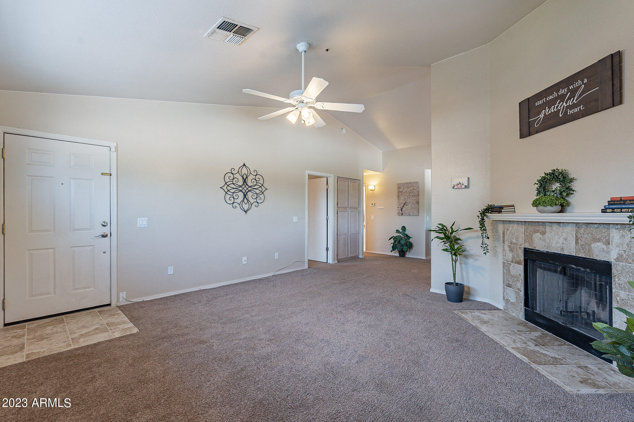 1222 West Baseline Road, Unit 237 Tempe, AZ 85283 - Photo 6 of 41 an empty room with windows and fireplace