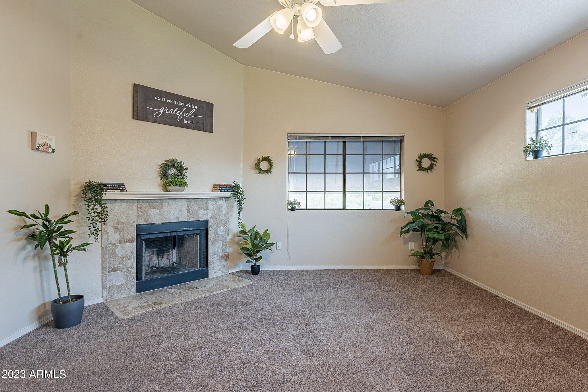 1222 West Baseline Road, Unit 237 Tempe, AZ 85283 - Photo 8 of 41 a living room with furniture and a potted plant