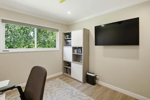a room with furniture and a flat screen tv