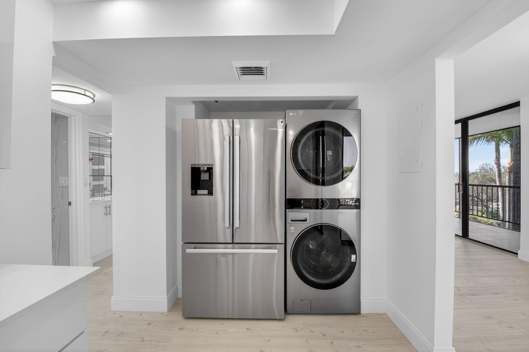 7738 Lakeside Boulevard, Unit 352 Boca Raton, FL 33434 - Photo 10 of 60 a utility room with sink dryer and washer