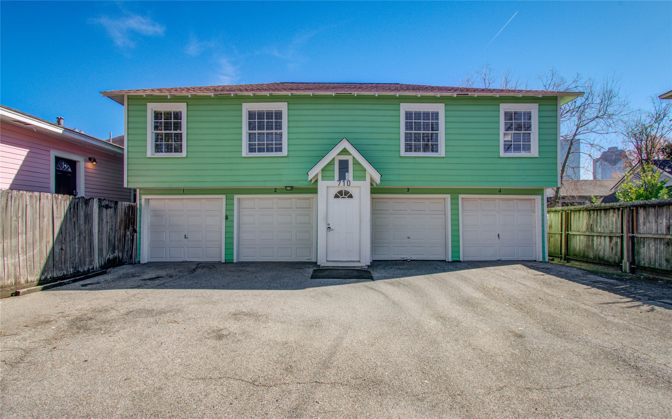 a front view of a house with a garage