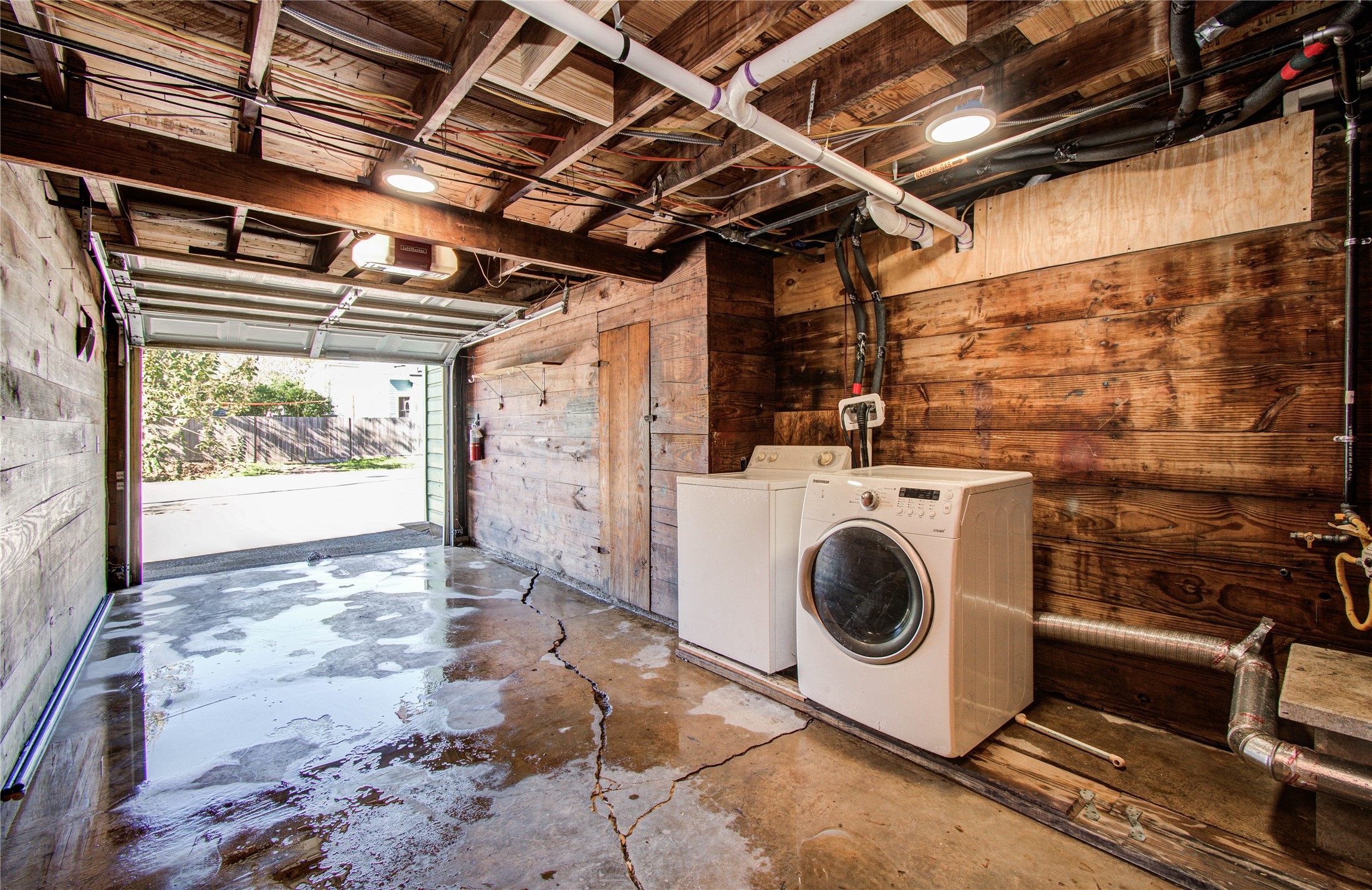 710 Hemphill Street, Unit 2 Houston, TX 77007 - Photo 18 of 21 a utility room with dryer and washer