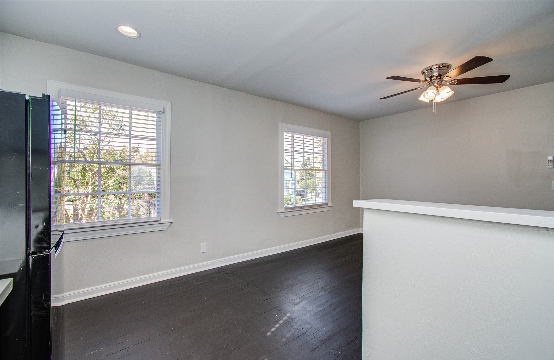 710 Hemphill Street, Unit 2 Houston, TX 77007 - Photo 5 of 21 a view of empty room with wooden floor and fan
