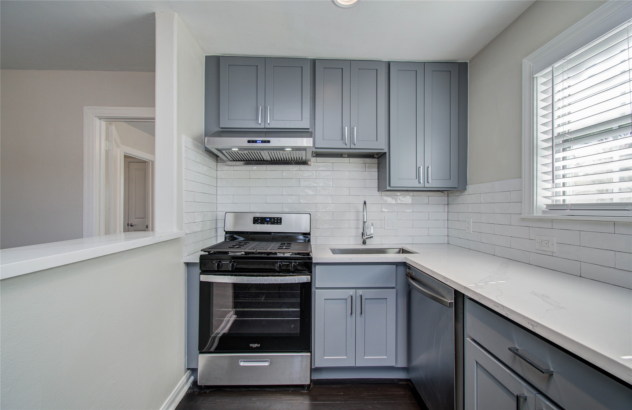 710 Hemphill Street, Unit 2 Houston, TX 77007 - Photo 8 of 21 a kitchen with a sink and cabinets