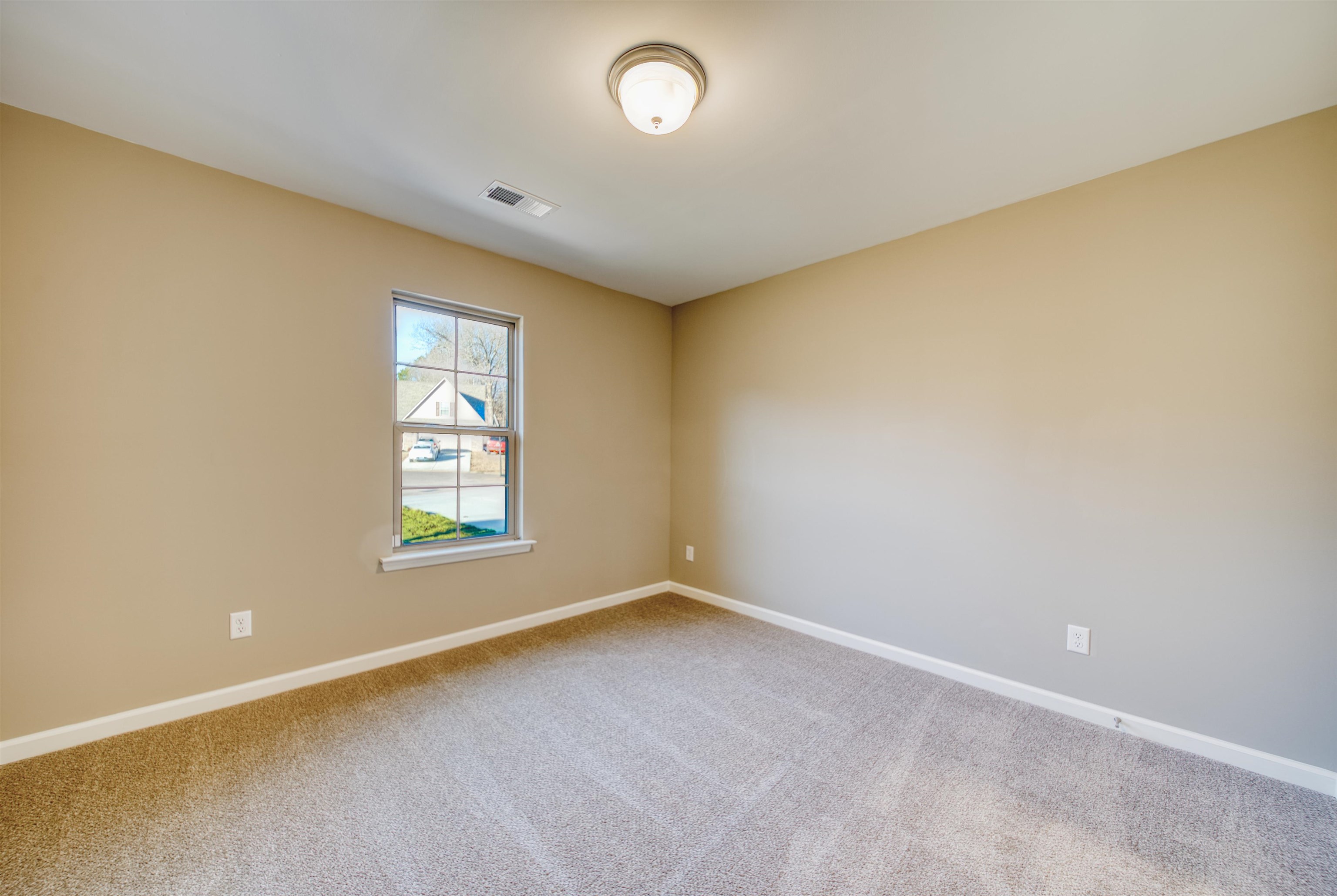 107 Stone Brook Cove Ripley, TN 38063 - Photo 14 of 31 an empty room with a empty space and a window
