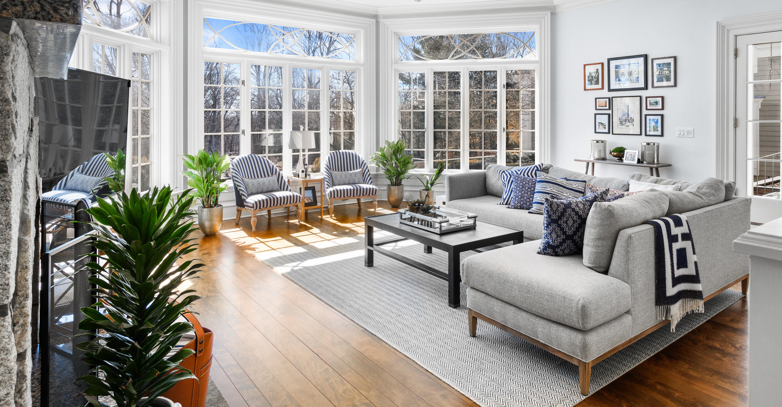 235 Brushy Ridge Road New Canaan, CT 06840 - Photo 12 of 28 a living room with furniture and a potted plant