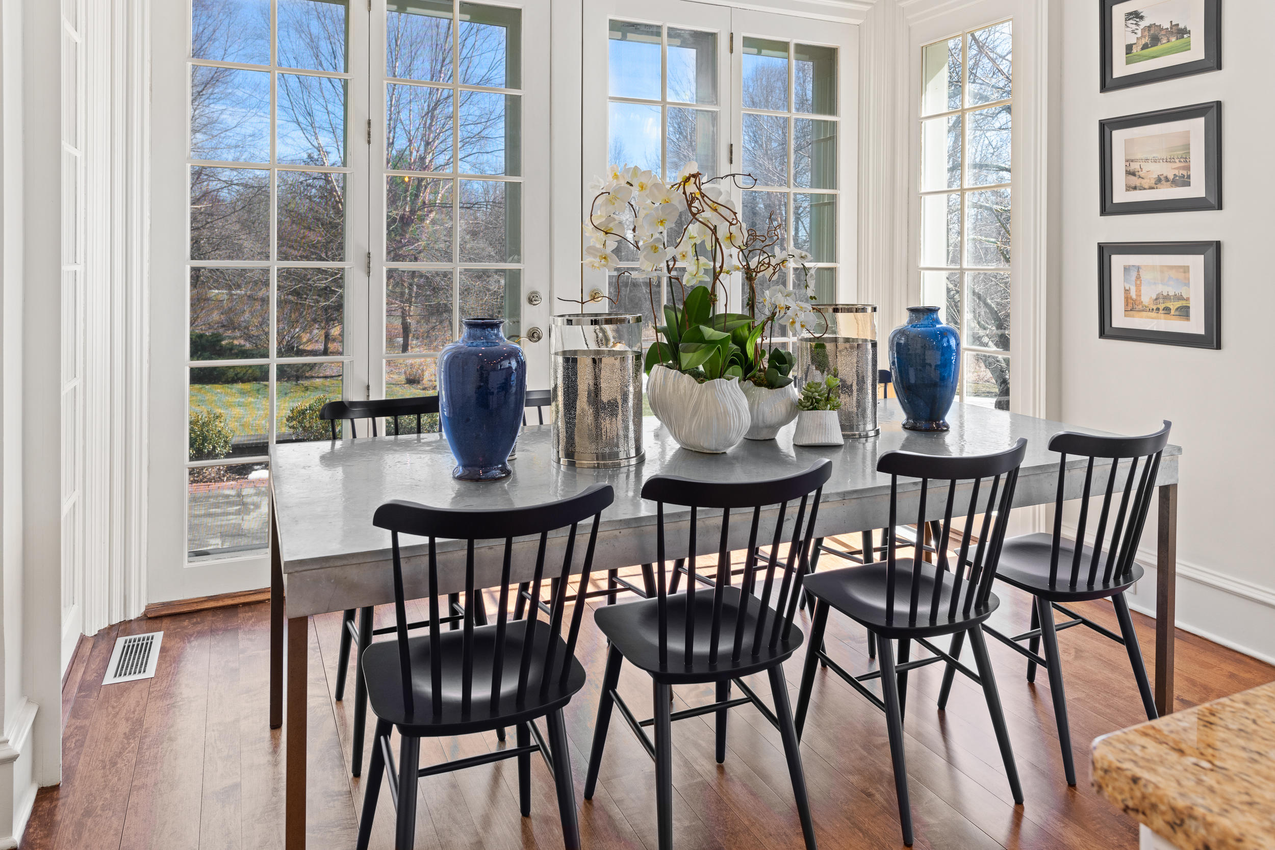 235 Brushy Ridge Road New Canaan, CT 06840 - Photo 16 of 28 a dining room with furniture a floor to ceiling windows and plants