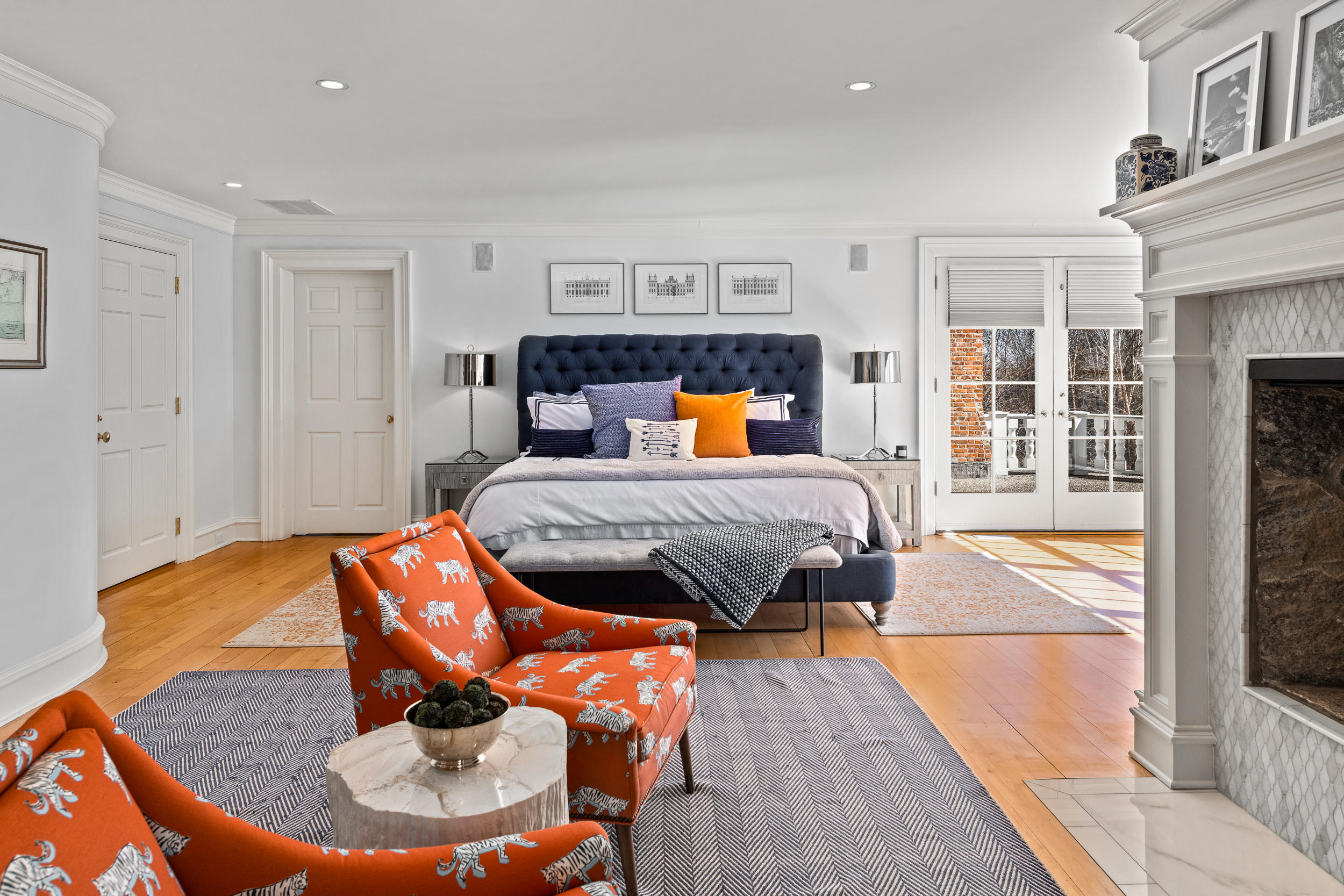 235 Brushy Ridge Road New Canaan, CT 06840 - Photo 21 of 28 a bedroom with a bed and wooden floor