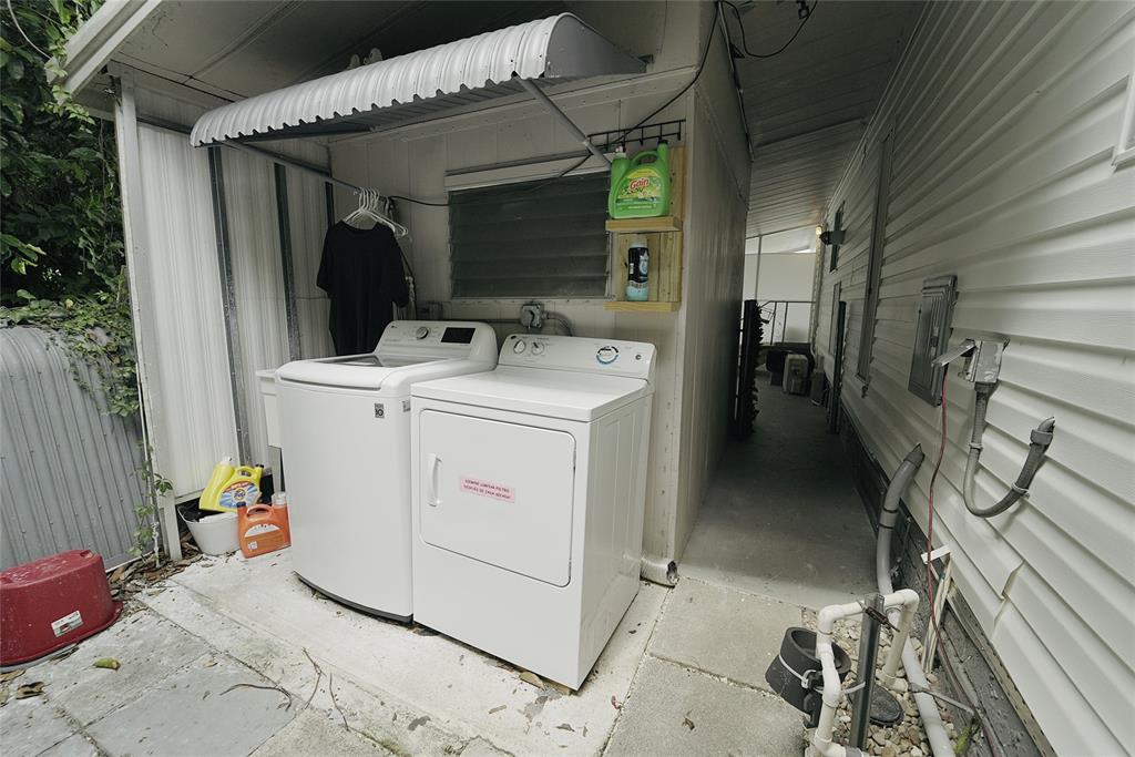 8520 Southwest 18th Court Davie, FL 33324 - Photo 17 of 48 a utility room with dryer and washer