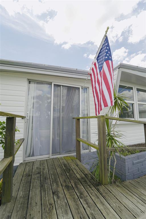 8520 Southwest 18th Court Davie, FL 33324 - Photo 40 of 48 a view of a balcony with wooden floor and fence