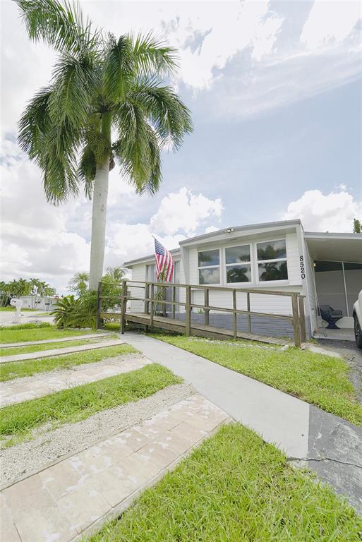 8520 Southwest 18th Court Davie, FL 33324 - Photo 43 of 48 a house with swimming pool in front of it