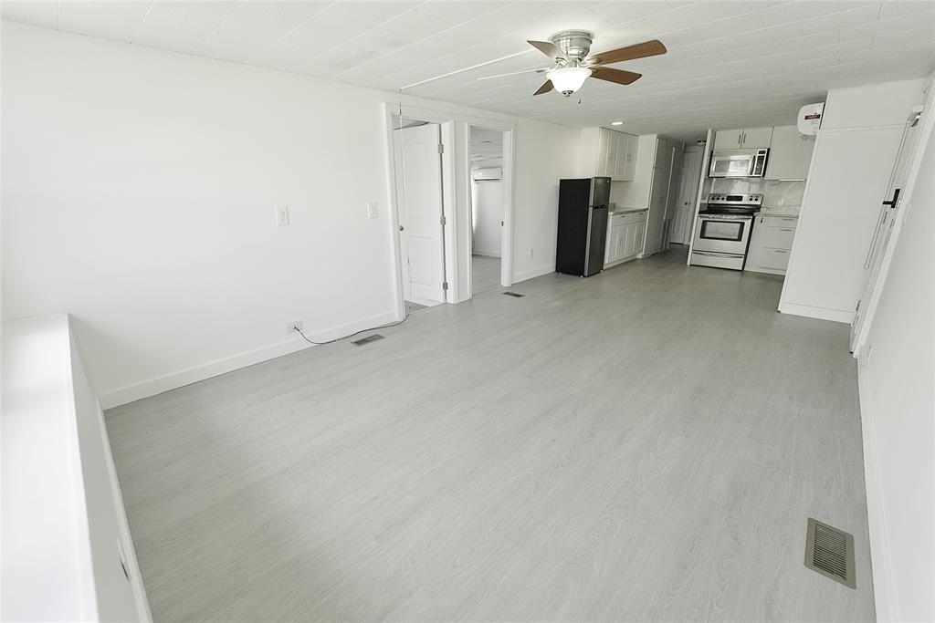 8520 Southwest 18th Court Davie, FL 33324 - Photo 6 of 48 wooden floor in an empty room