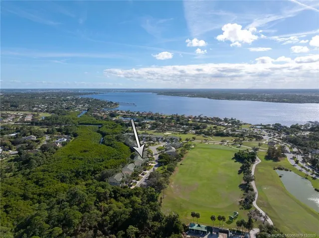 a view of a lake in middle of a city