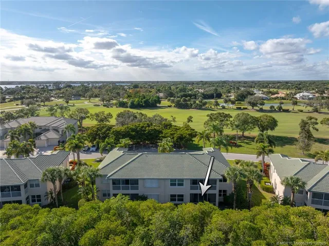 an aerial view of a house with a garden