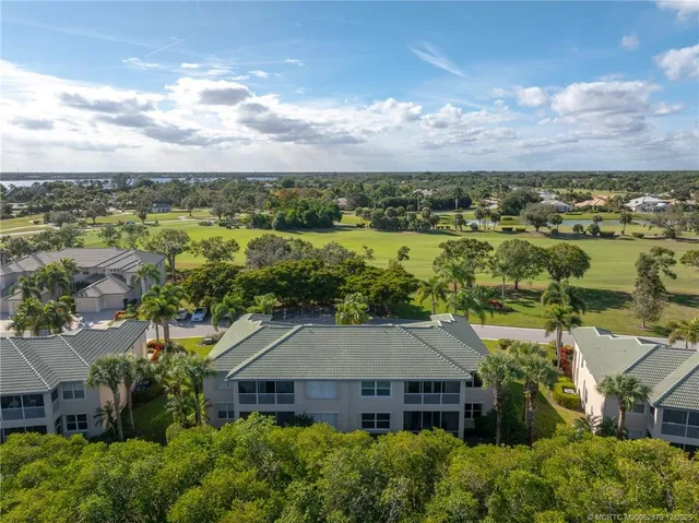 an aerial view of a house with a garden