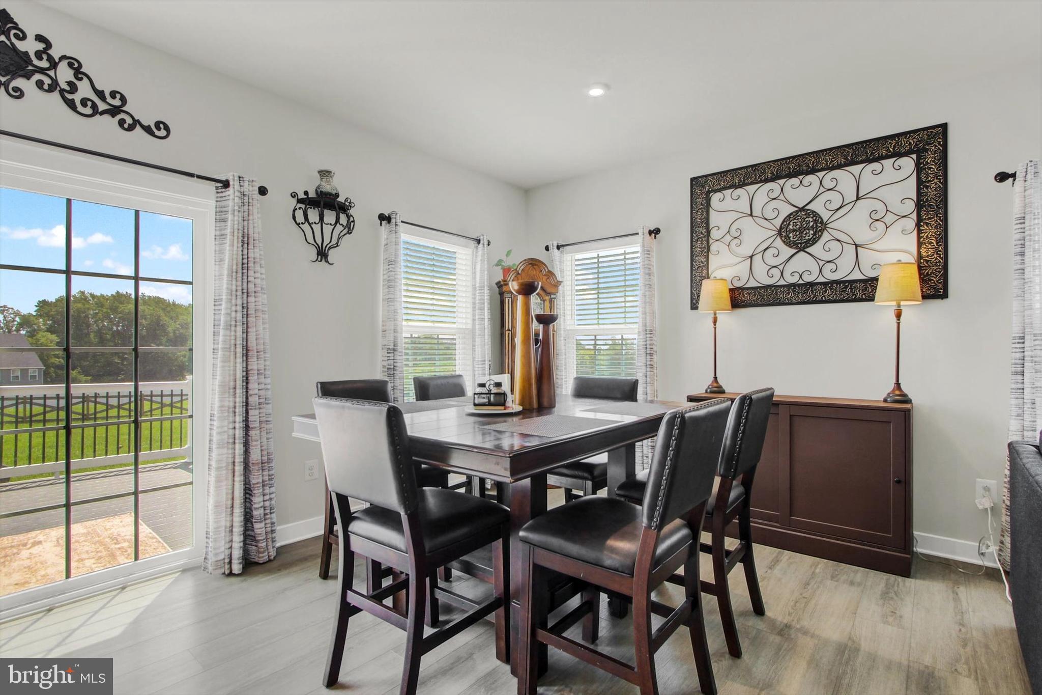 1480 Beck Mill Road Hanover, PA 17331 - Photo 13 of 71 a view of a dining room with furniture and wooden floor