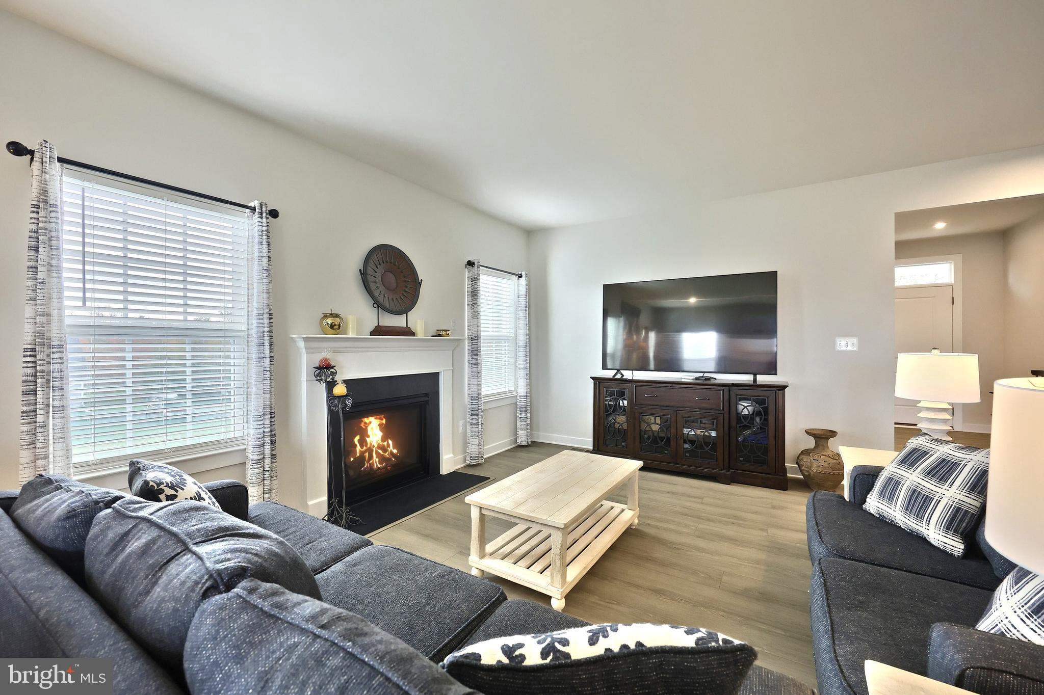 1480 Beck Mill Road Hanover, PA 17331 - Photo 17 of 71 a living room with furniture and a fireplace