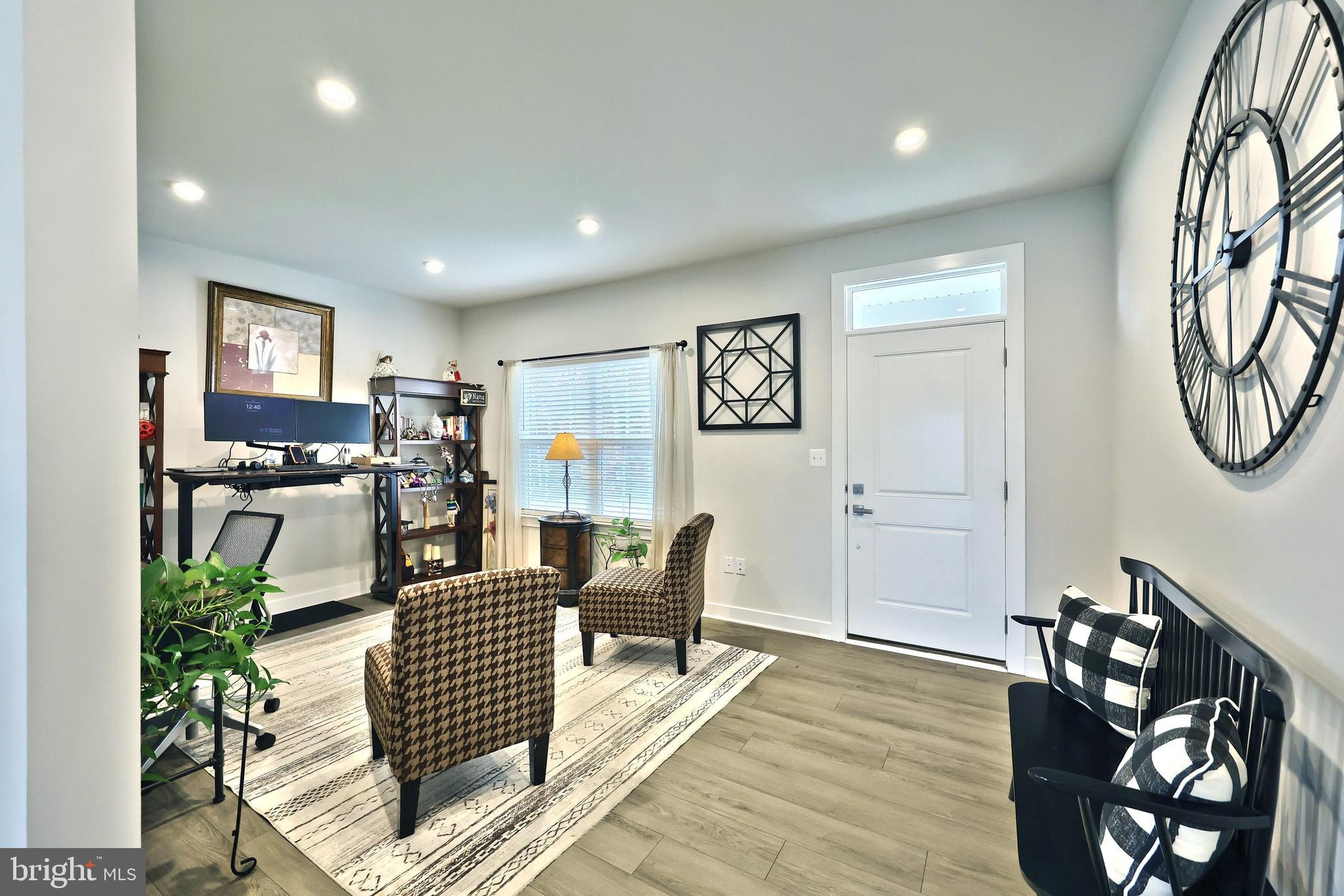 1480 Beck Mill Road Hanover, PA 17331 - Photo 20 of 71 a living room with furniture a dining table and a large window