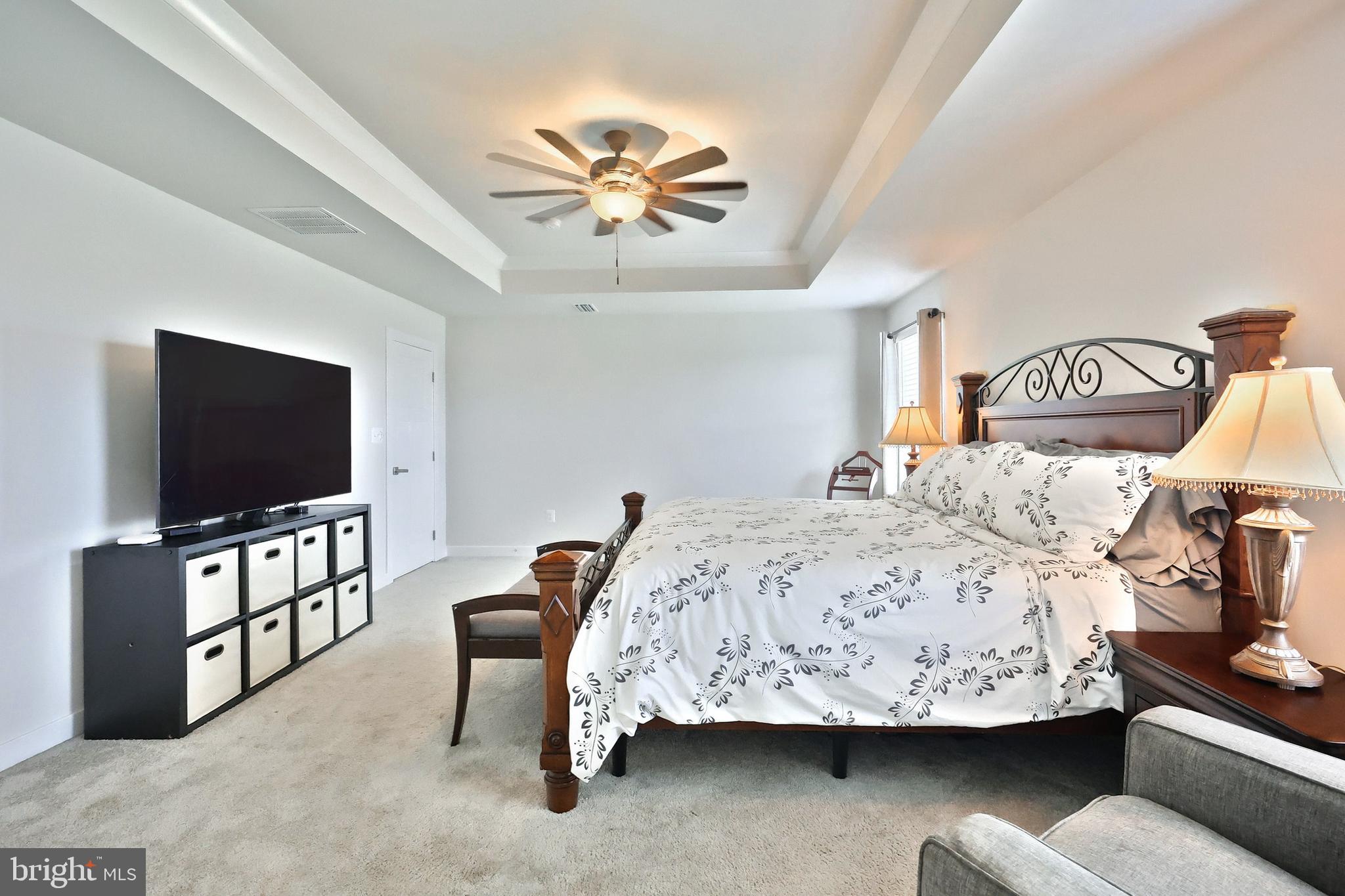 1480 Beck Mill Road Hanover, PA 17331 - Photo 25 of 71 a bedroom with a bed and a flat screen tv