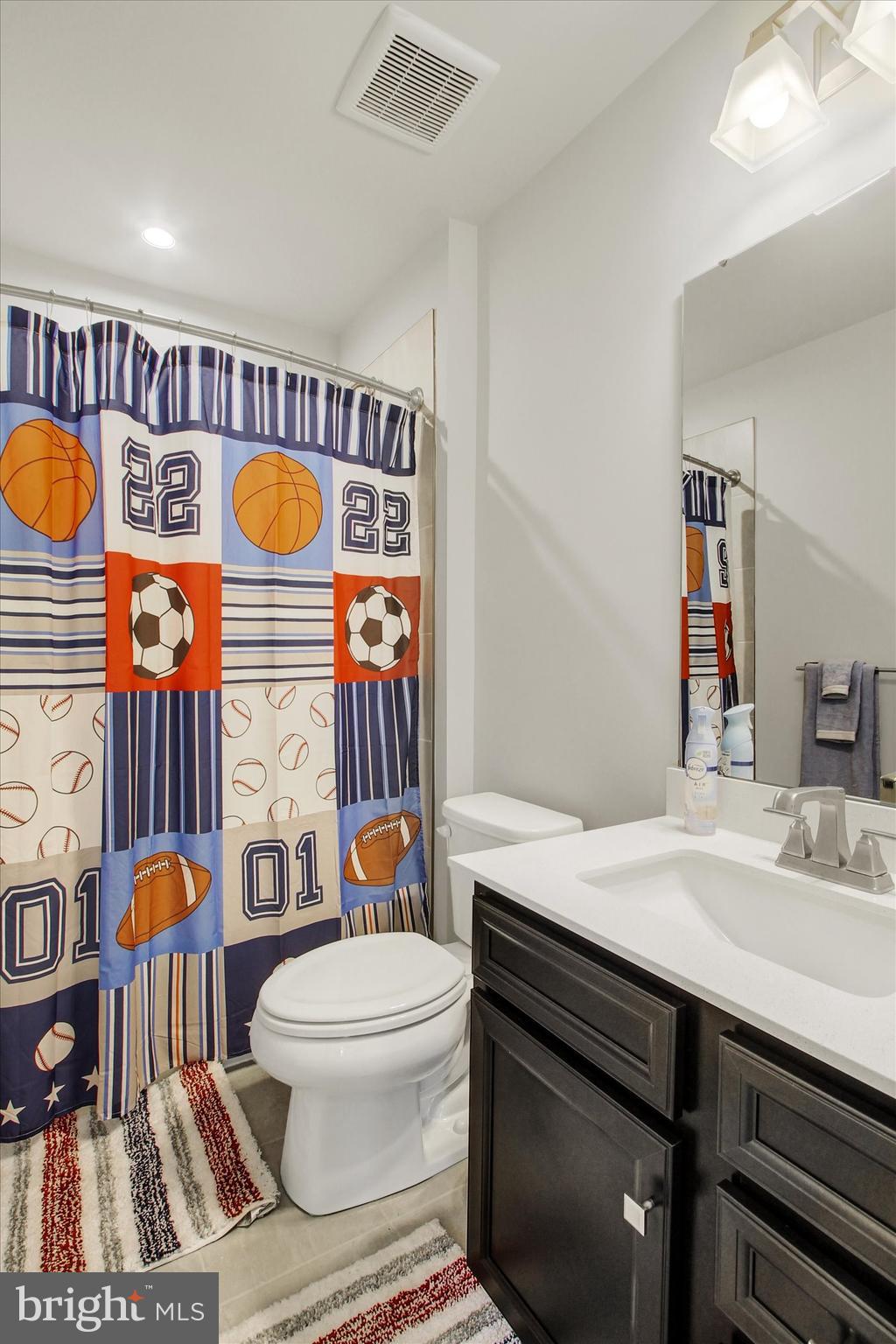 1480 Beck Mill Road Hanover, PA 17331 - Photo 32 of 71 a bathroom with a sink a toilet and a mirror