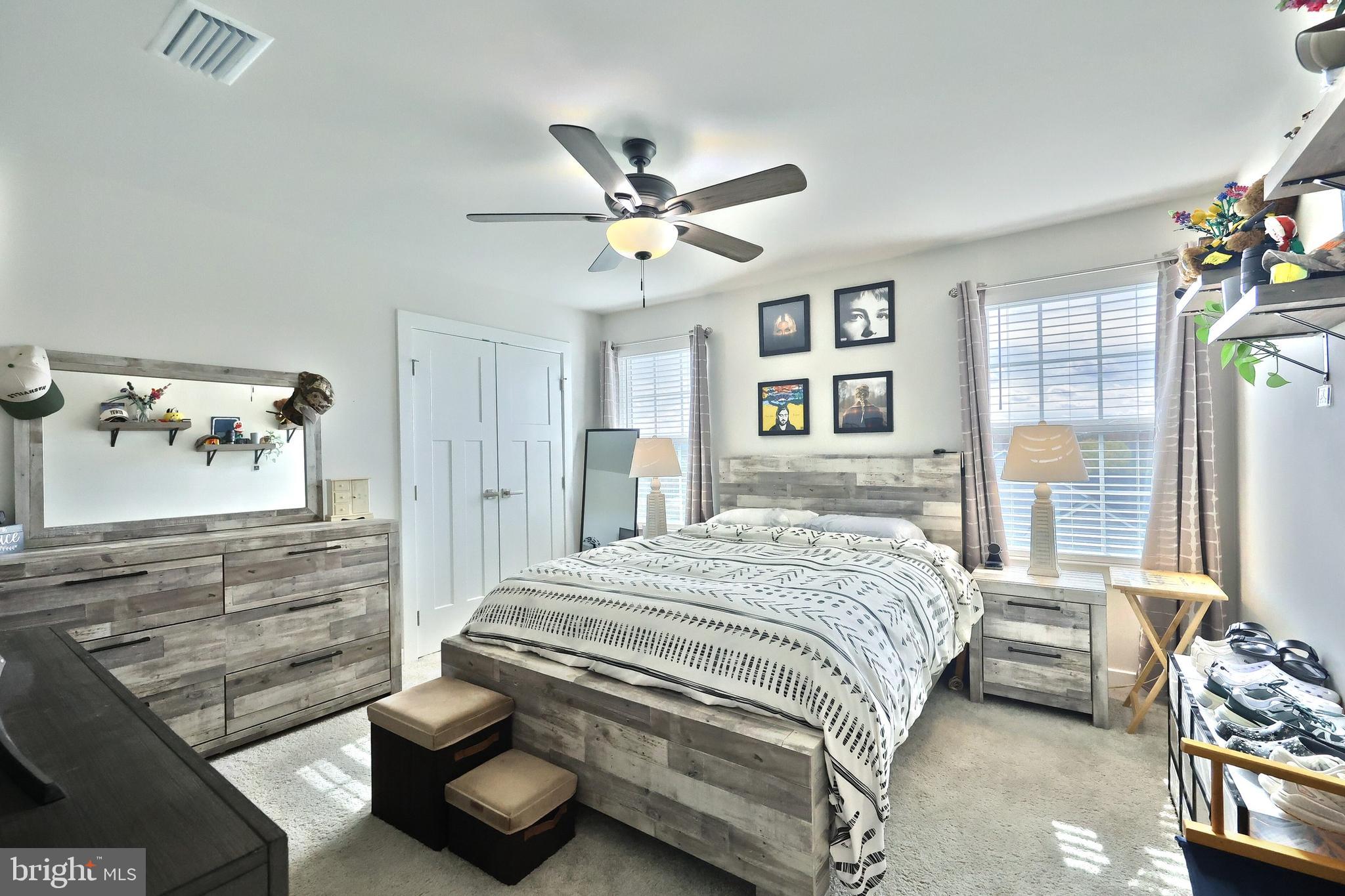 1480 Beck Mill Road Hanover, PA 17331 - Photo 36 of 71 a bedroom with a bed and a chandelier