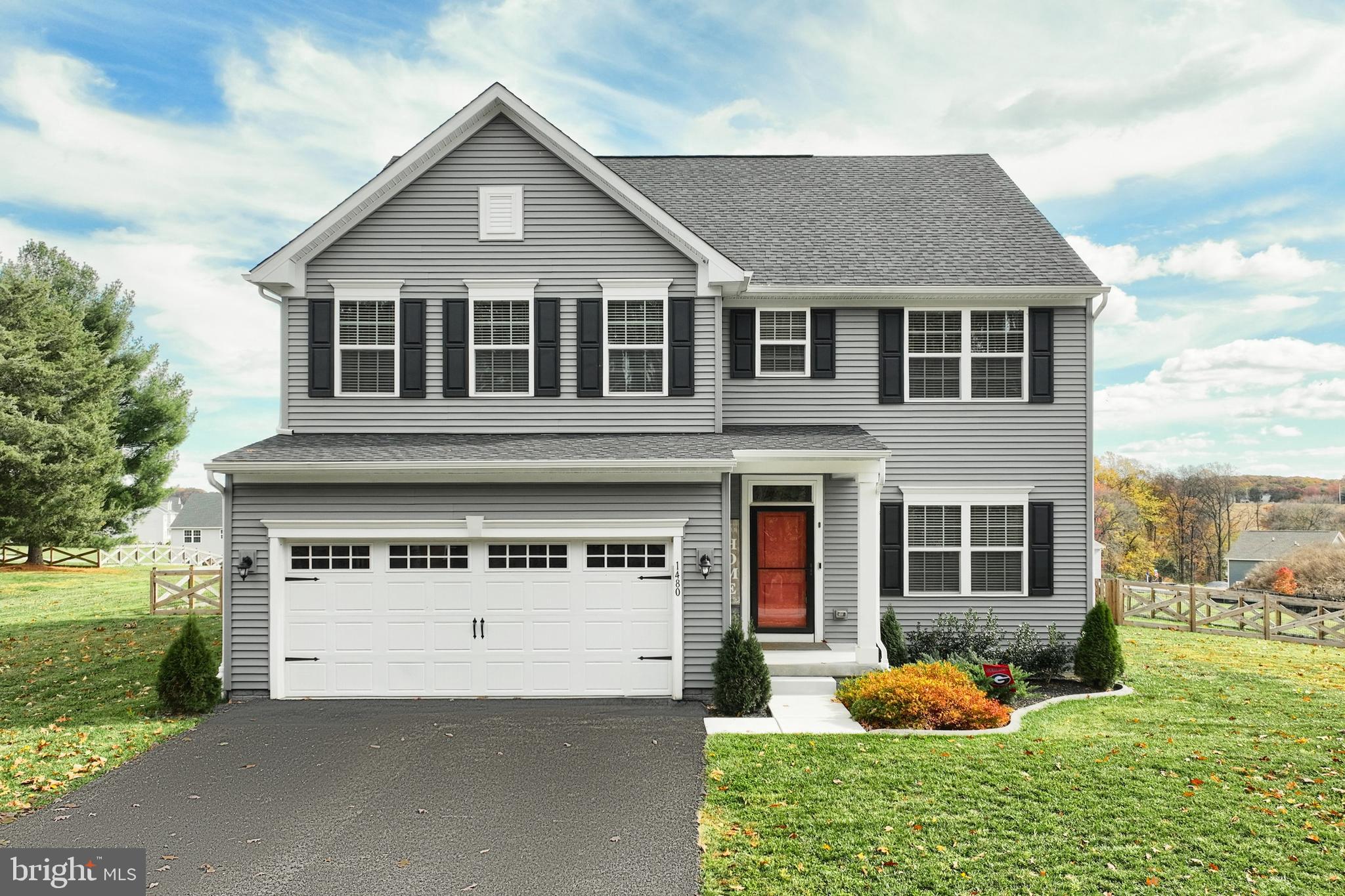 1480 Beck Mill Road Hanover, PA 17331 - Photo 4 of 71 a front view of a house with a yard