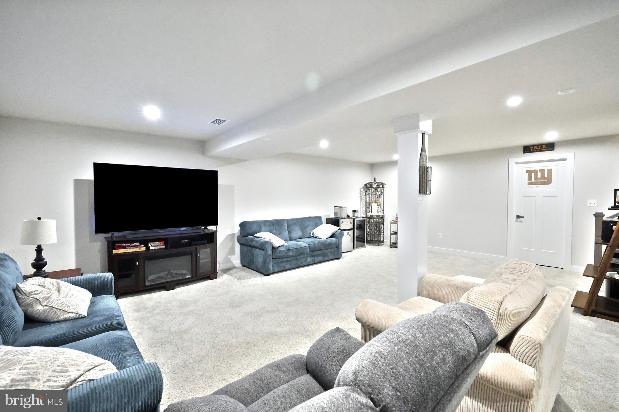 1480 Beck Mill Road Hanover, PA 17331 - Photo 44 of 71 a living room with furniture and a flat screen tv