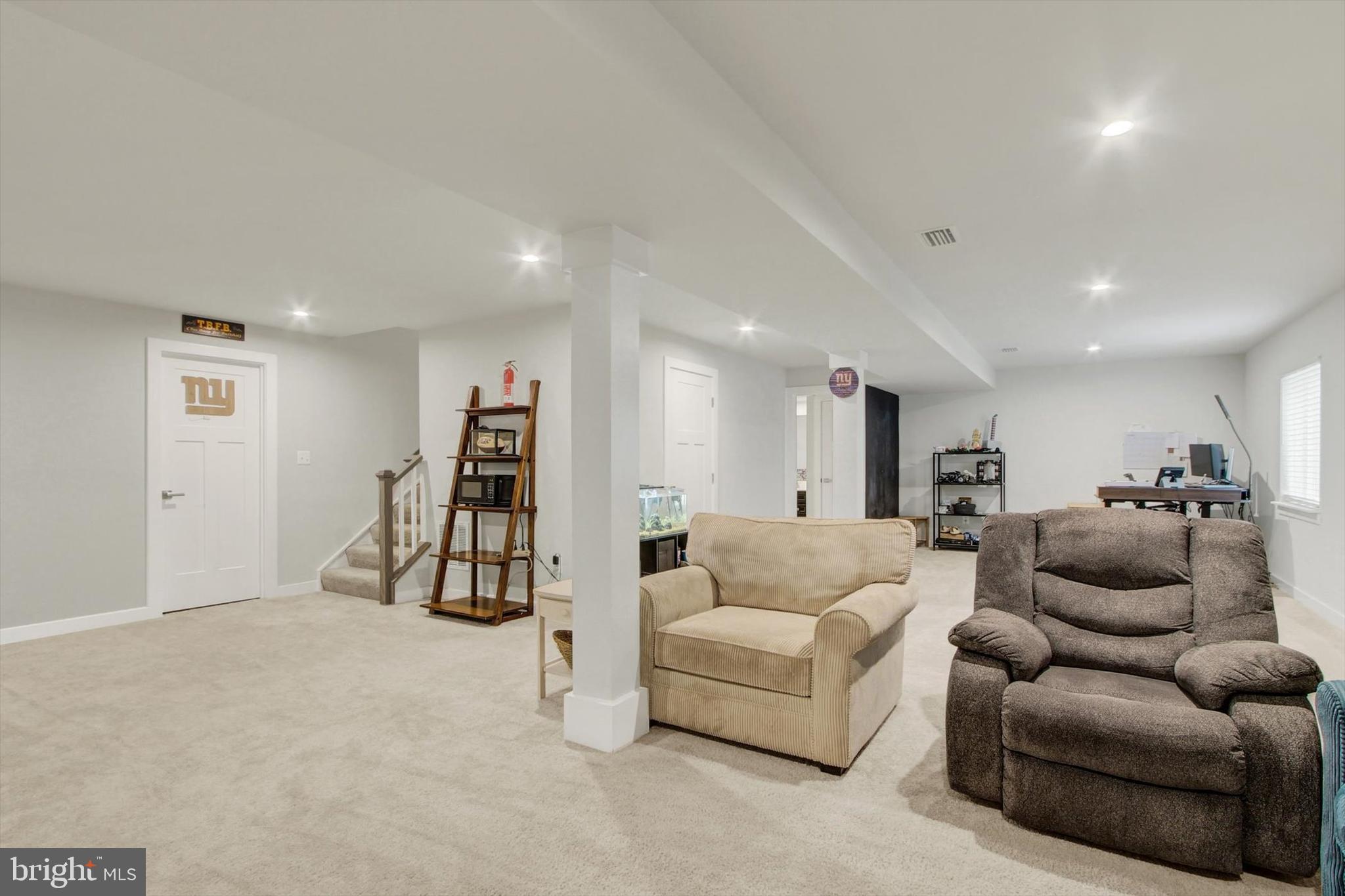 1480 Beck Mill Road Hanover, PA 17331 - Photo 46 of 71 a living room with furniture and a gym with equipment
