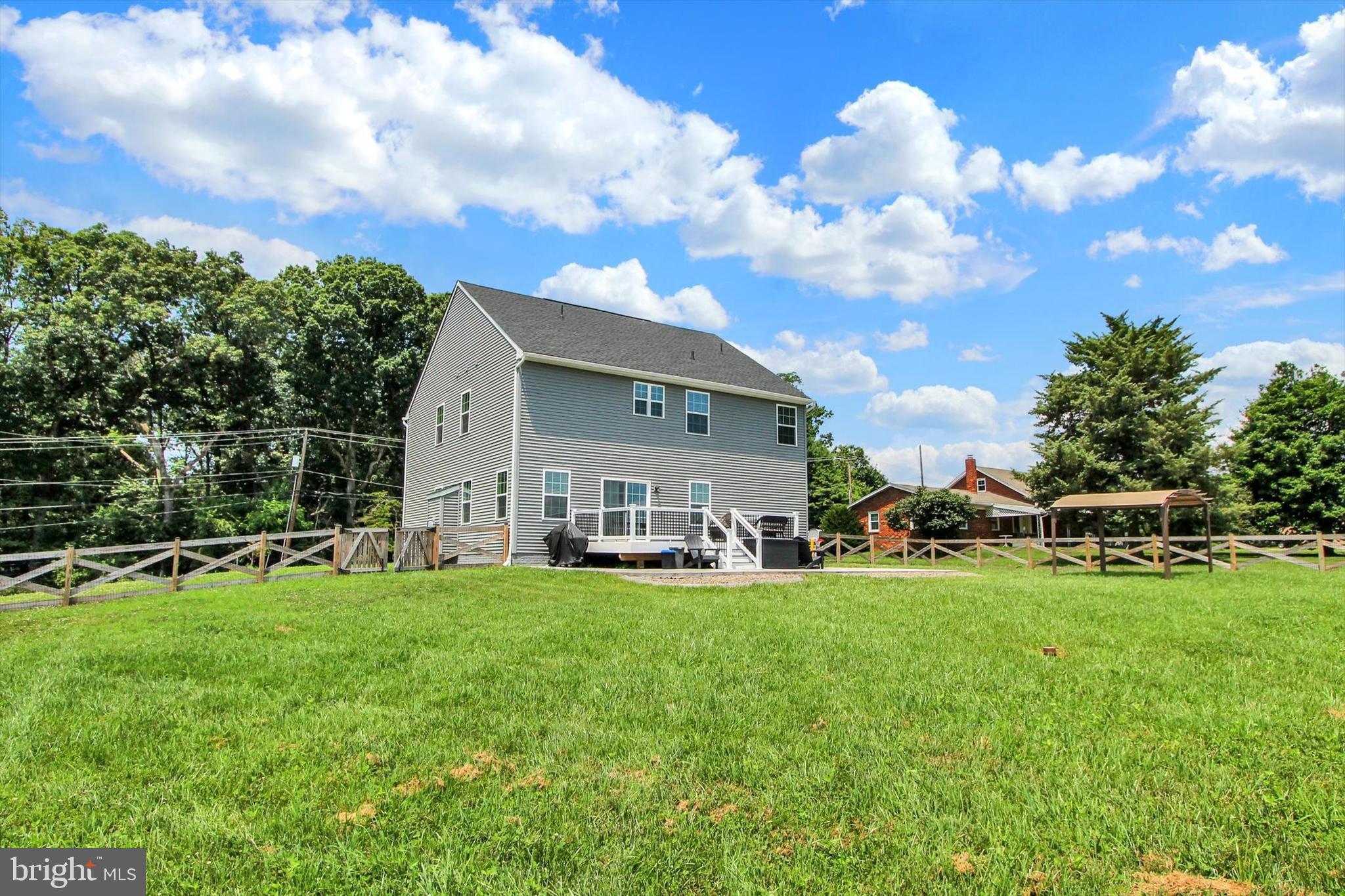 1480 Beck Mill Road Hanover, PA 17331 - Photo 56 of 71 a view of a house with a big yard and a large tree