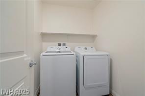 12347 Indigo Montage Road, Unit 3 Las Vegas, NV 89183 - Photo 19 of 23 A well-organized laundry area offers a convenient space for household tasks.