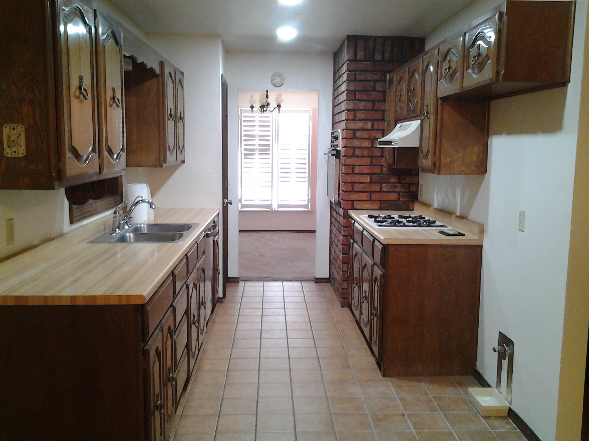 216 Northeast 26th Street Lamesa, TX 79331 - Photo 3 of 15 Kitchen 1.2