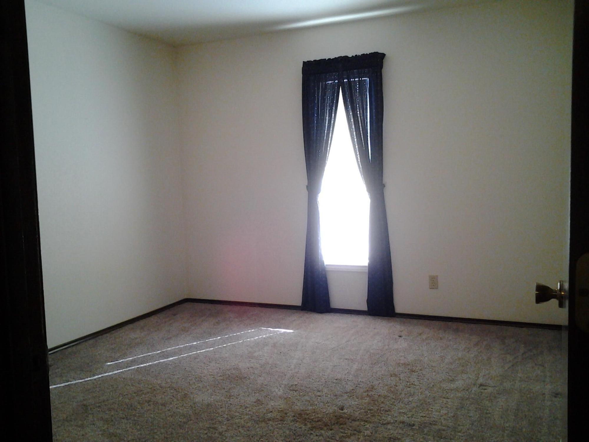 216 Northeast 26th Street Lamesa, TX 79331 - Photo 5 of 15 Bedroom 3