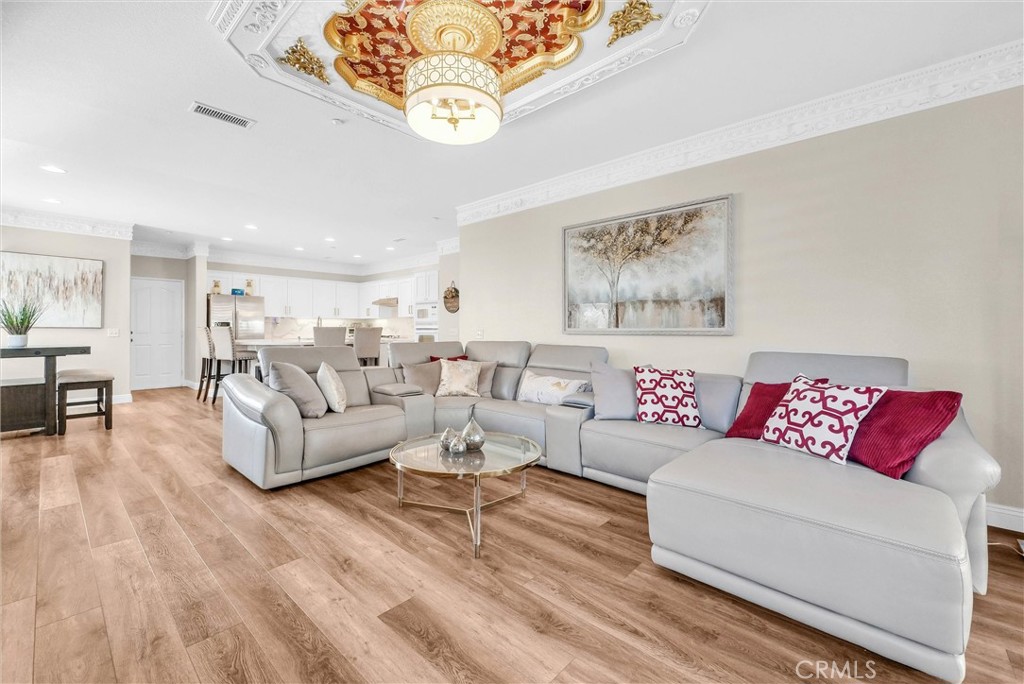 11499 Bridgeway Drive Riverside, CA 92505 - Photo 16 of 65 a living room with furniture and a wooden floor