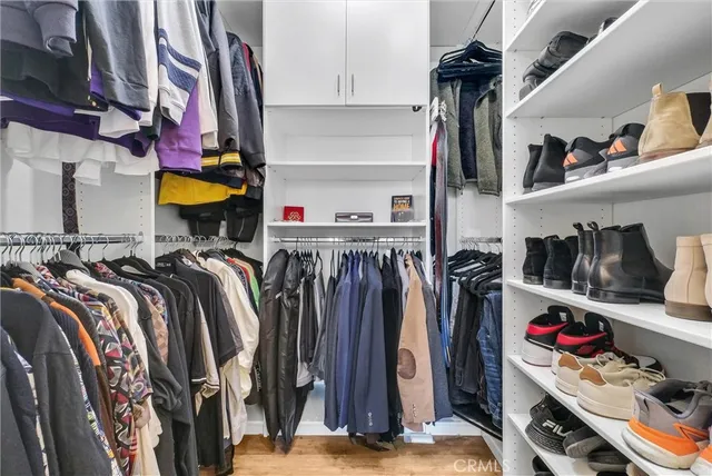 a bathroom with a sink a toilet and shower curtain