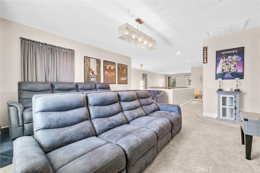11499 Bridgeway Drive Riverside, CA 92505 - Photo 34 of 65 a living room with furniture and a large window