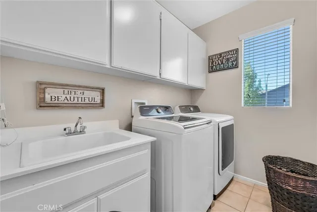 a view of a chairs and table in the patio