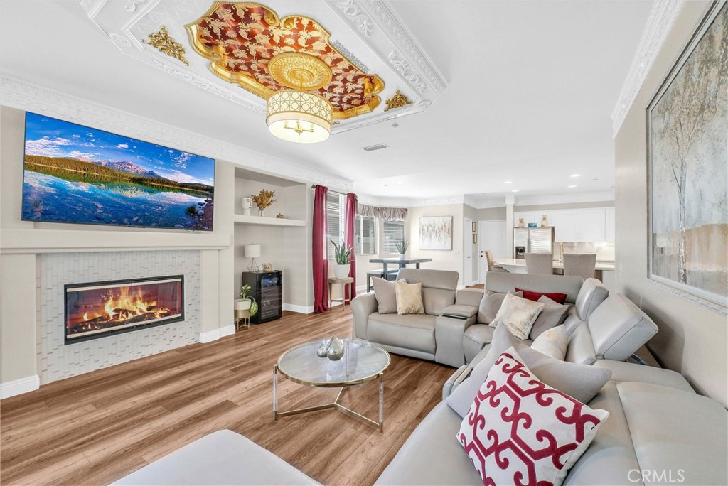 11499 Bridgeway Drive Riverside, CA 92505 - Photo 4 of 65 a living room with furniture and a fireplace