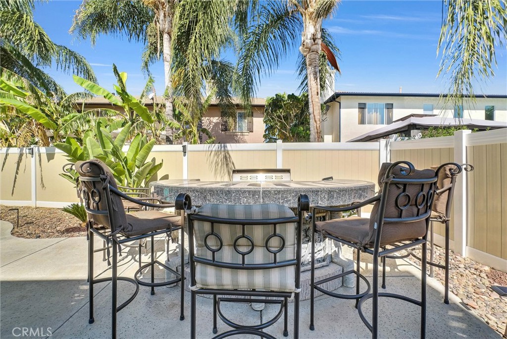 11499 Bridgeway Drive Riverside, CA 92505 - Photo 48 of 65 a view of a chairs and table in the patio
