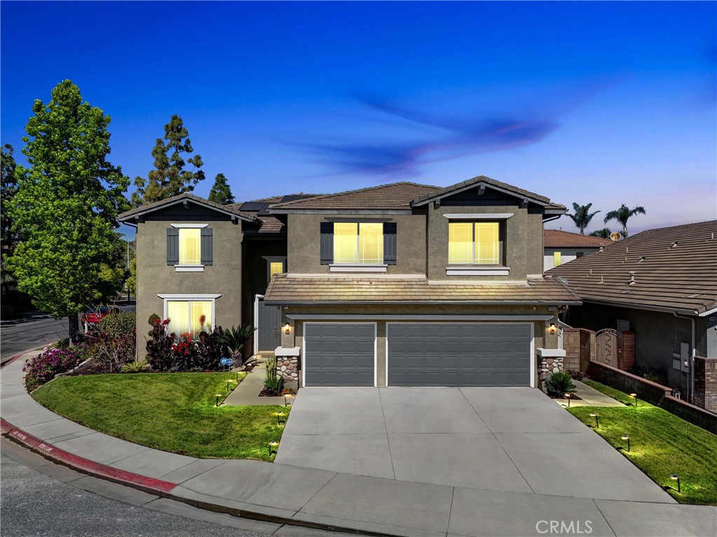 11499 Bridgeway Drive Riverside, CA 92505 - Photo 6 of 65 a front view of a house with a yard