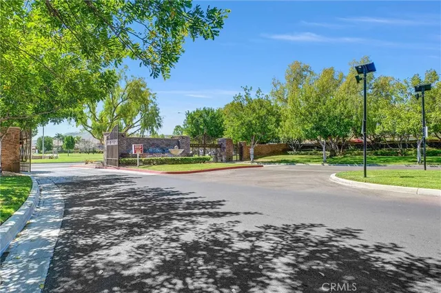 a living room with furniture and stairs