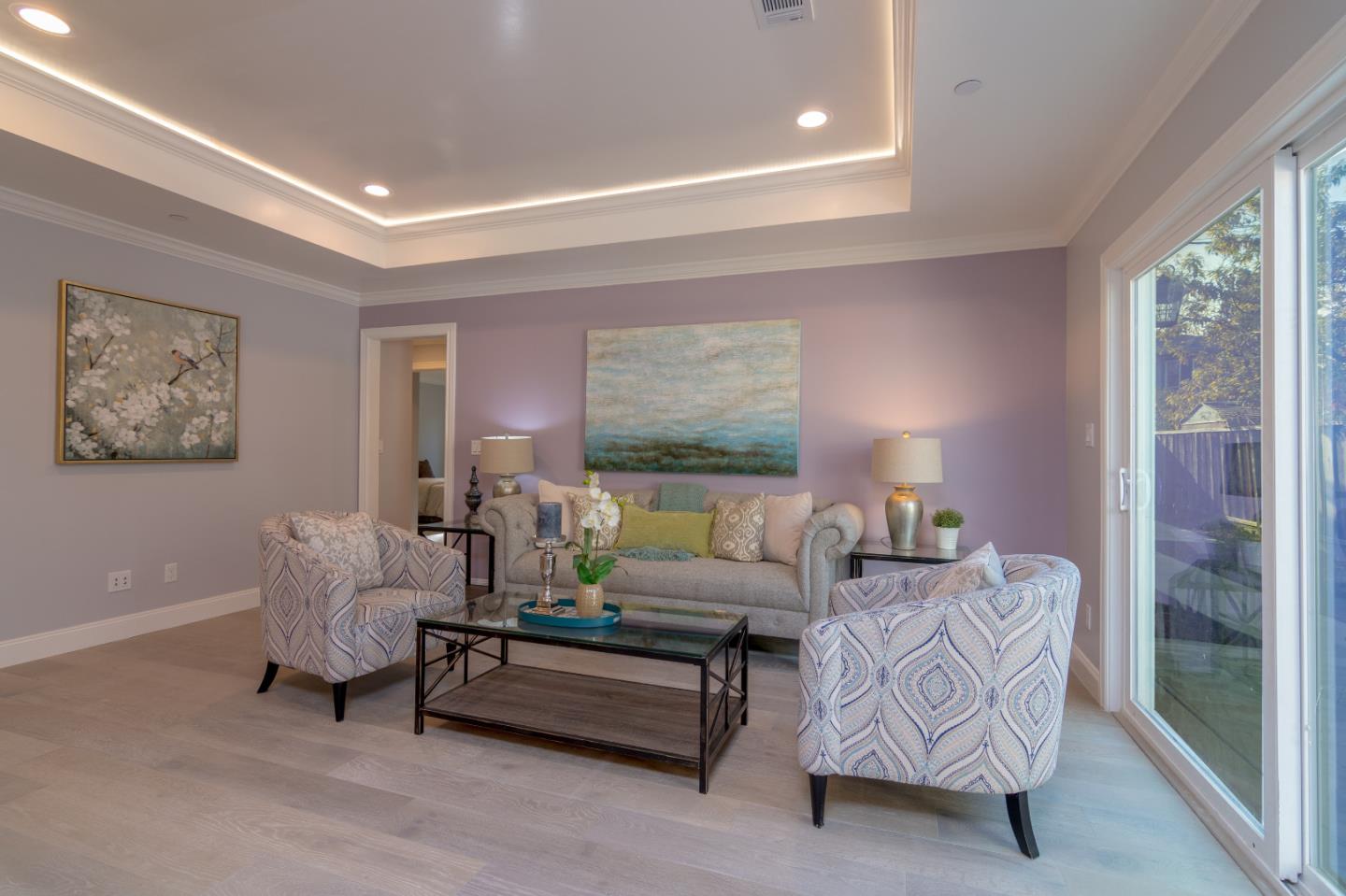 654 Malarin Avenue Santa Clara, CA 95050 - Photo 12 of 31 a living room with furniture and a large window