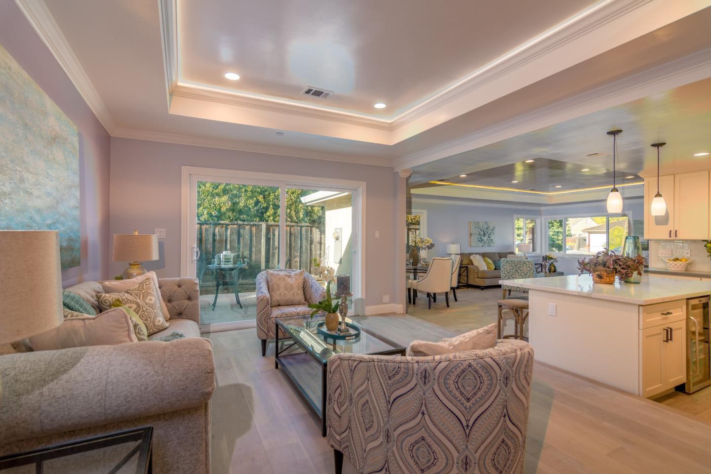 654 Malarin Avenue Santa Clara, CA 95050 - Photo 13 of 31 a living room with furniture and a large window