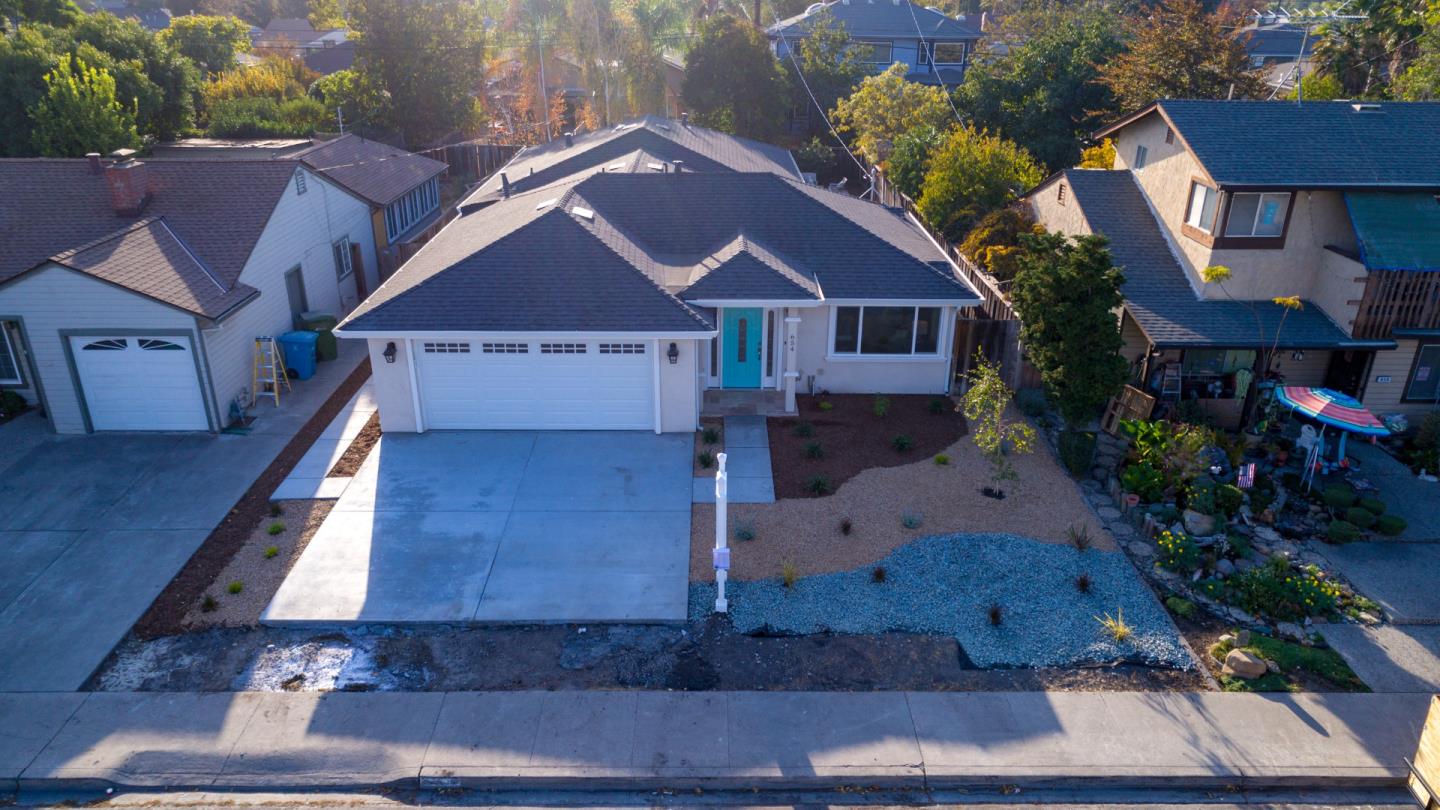 654 Malarin Avenue Santa Clara, CA 95050 - Photo 2 of 31 a house with trees in the background