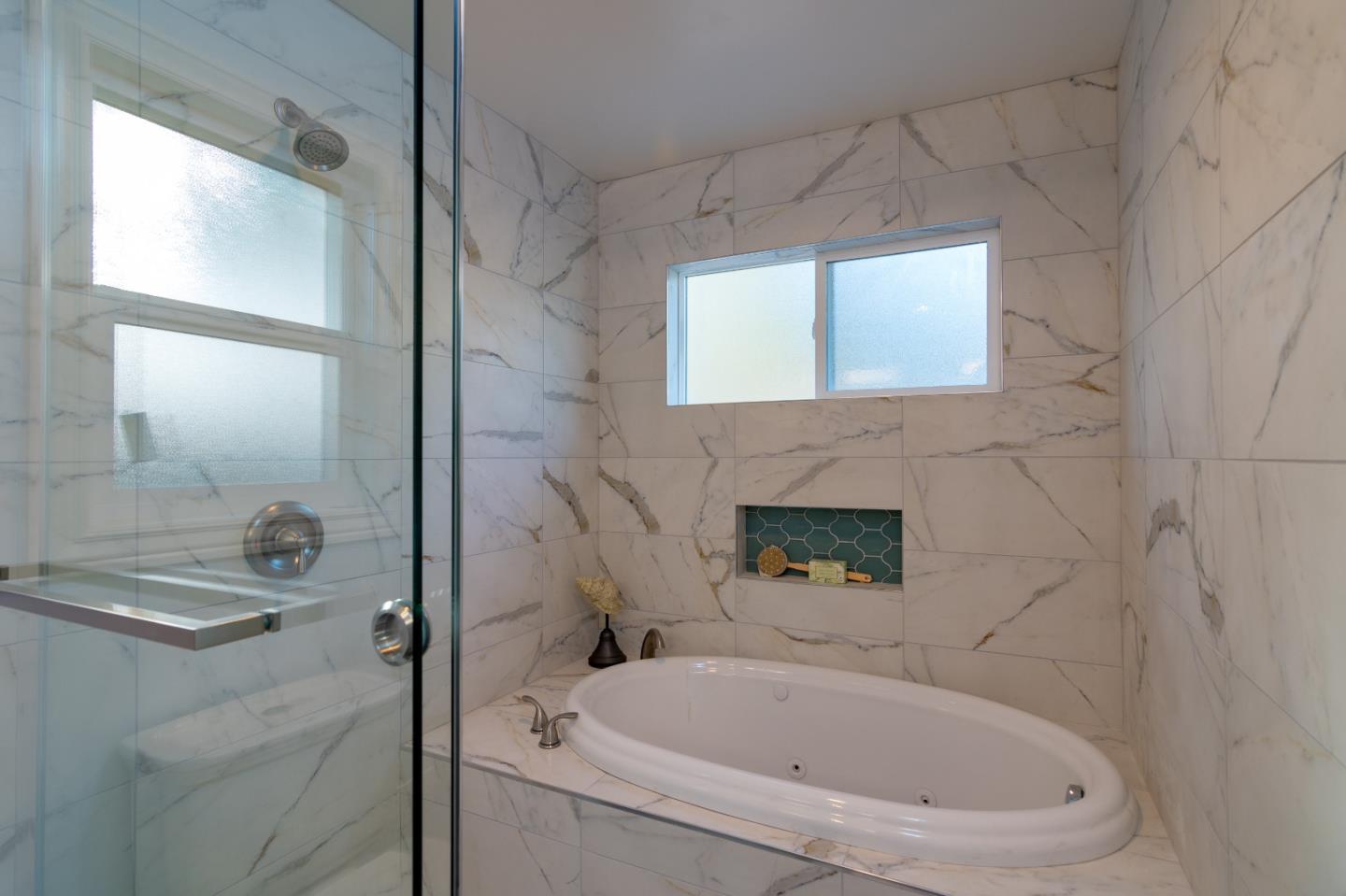 654 Malarin Avenue Santa Clara, CA 95050 - Photo 22 of 31 a bathroom with a bathtub